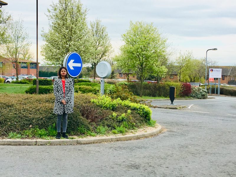 Cllr Shammi Akter on the roundabout at the entrance to the Woughton Campus